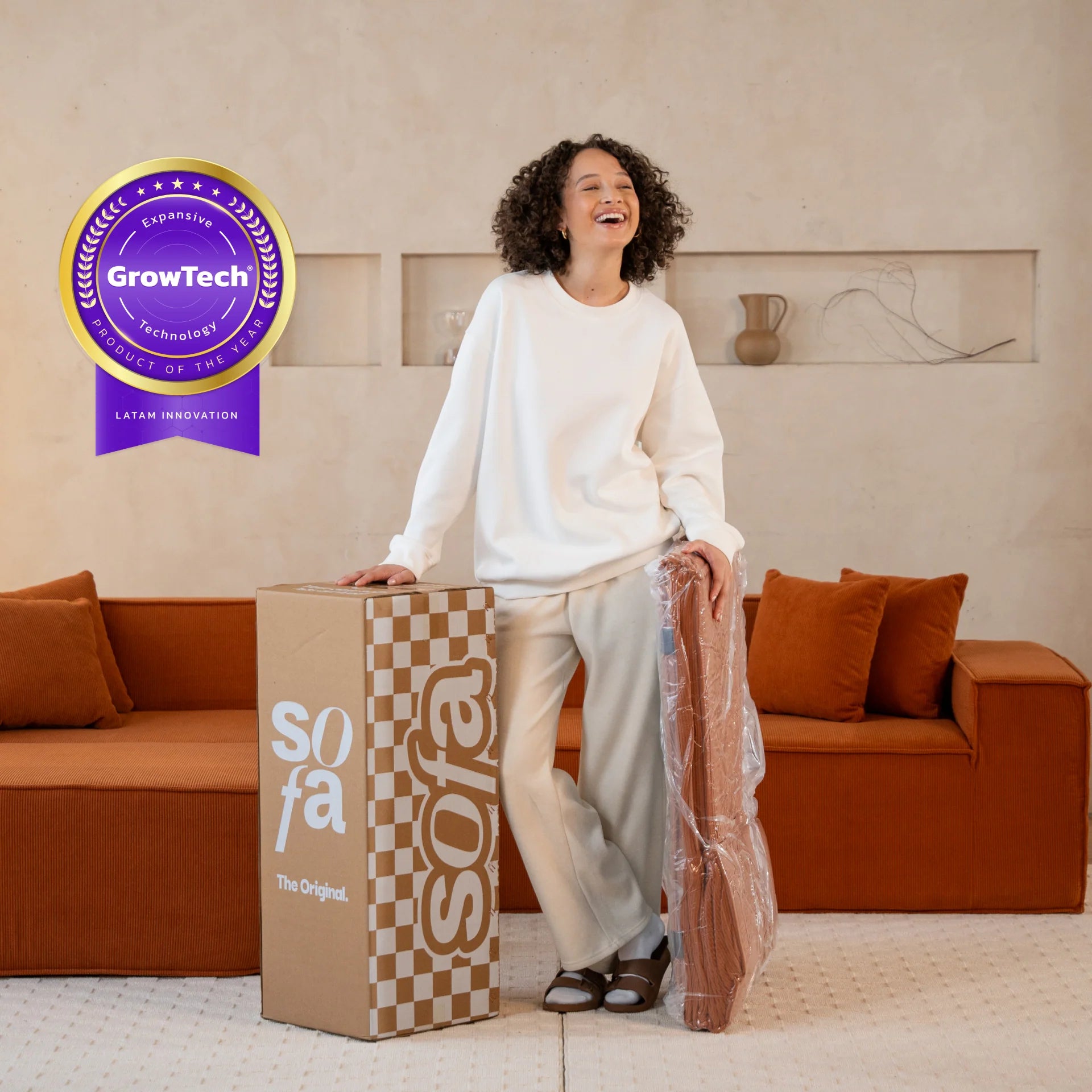 <tc>Sofa na Caixa</tc>  <tc>Pelion</tc> 3 assentos + 1 chaleiros no bujão - laranja