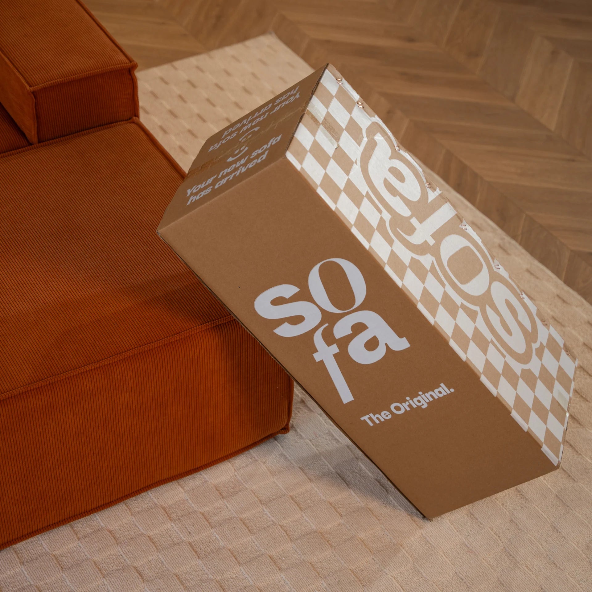 <tc>Sofa na Caixa</tc>  <tc>Pelion</tc> 3 assentos + 1 chaleiros no bujão - laranja